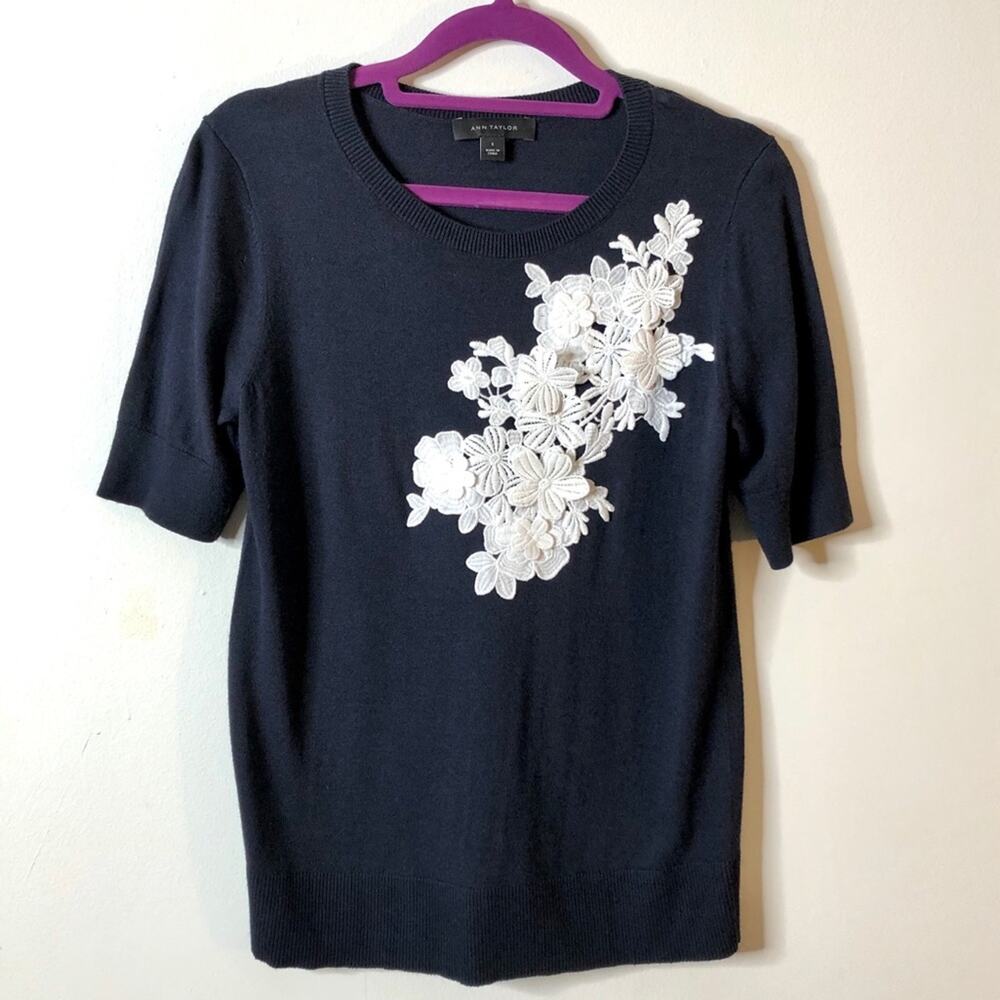 Ann Taylor navy sweater with white flower appliqué
